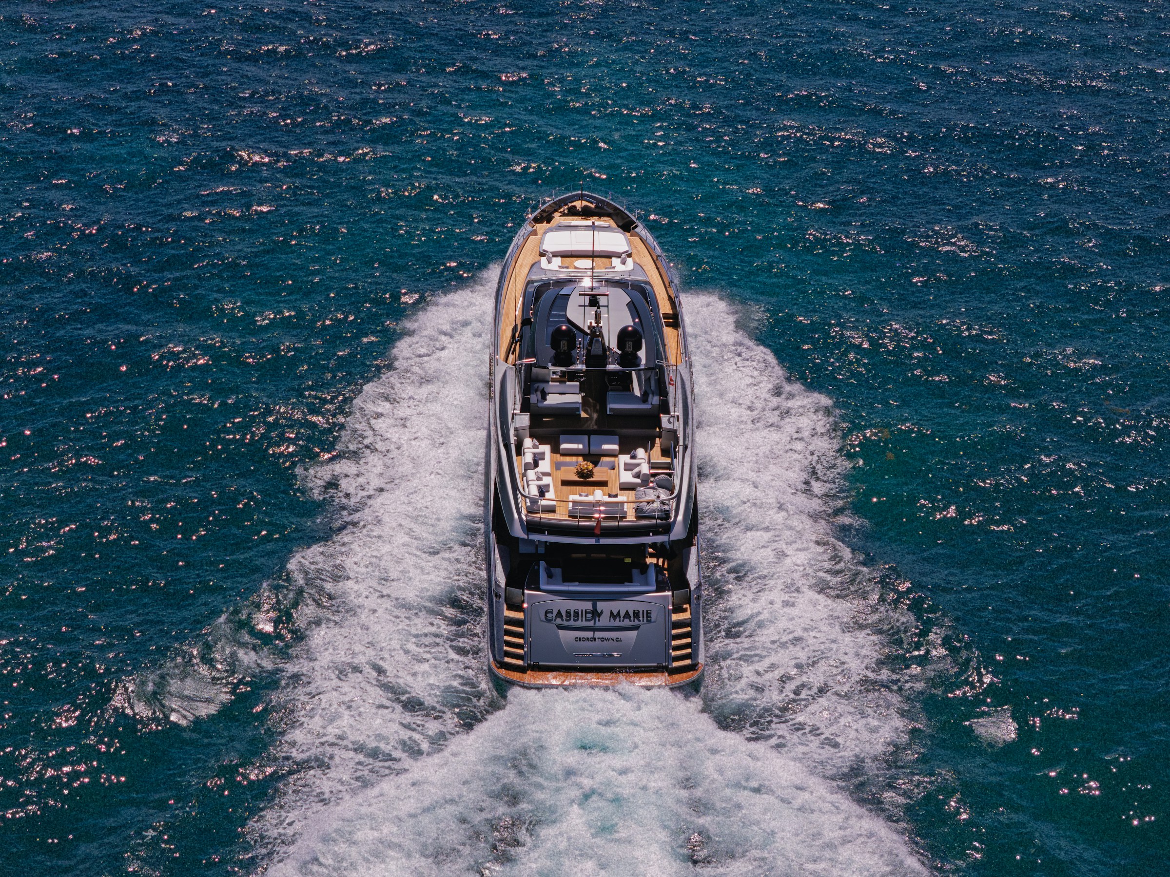 Luxury yacht moving across open water